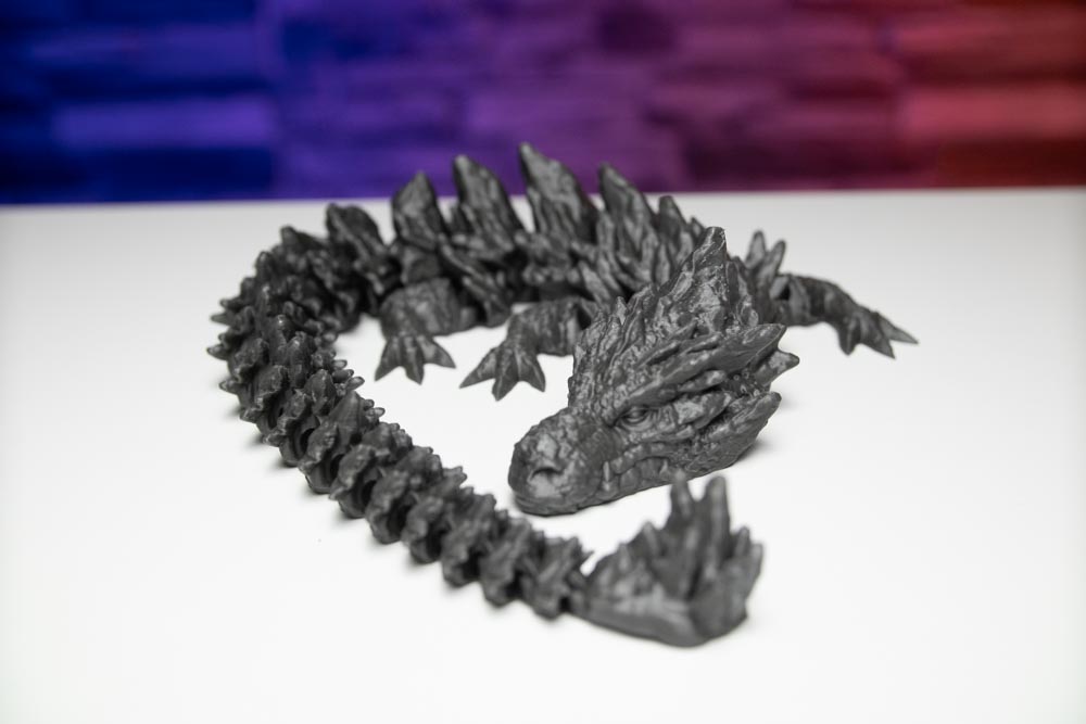 3D Print Articulated Stone Mama Dragon STL for download